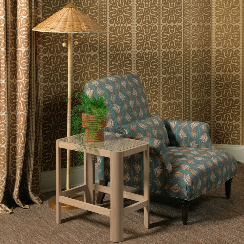 Pinyon Drink Table in Costa Finish in a living room at Addison West