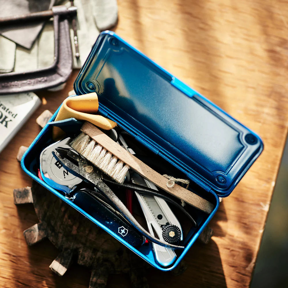 Toyo Steel Stackable Storage Box T-190 in Blue on a table at Addison West