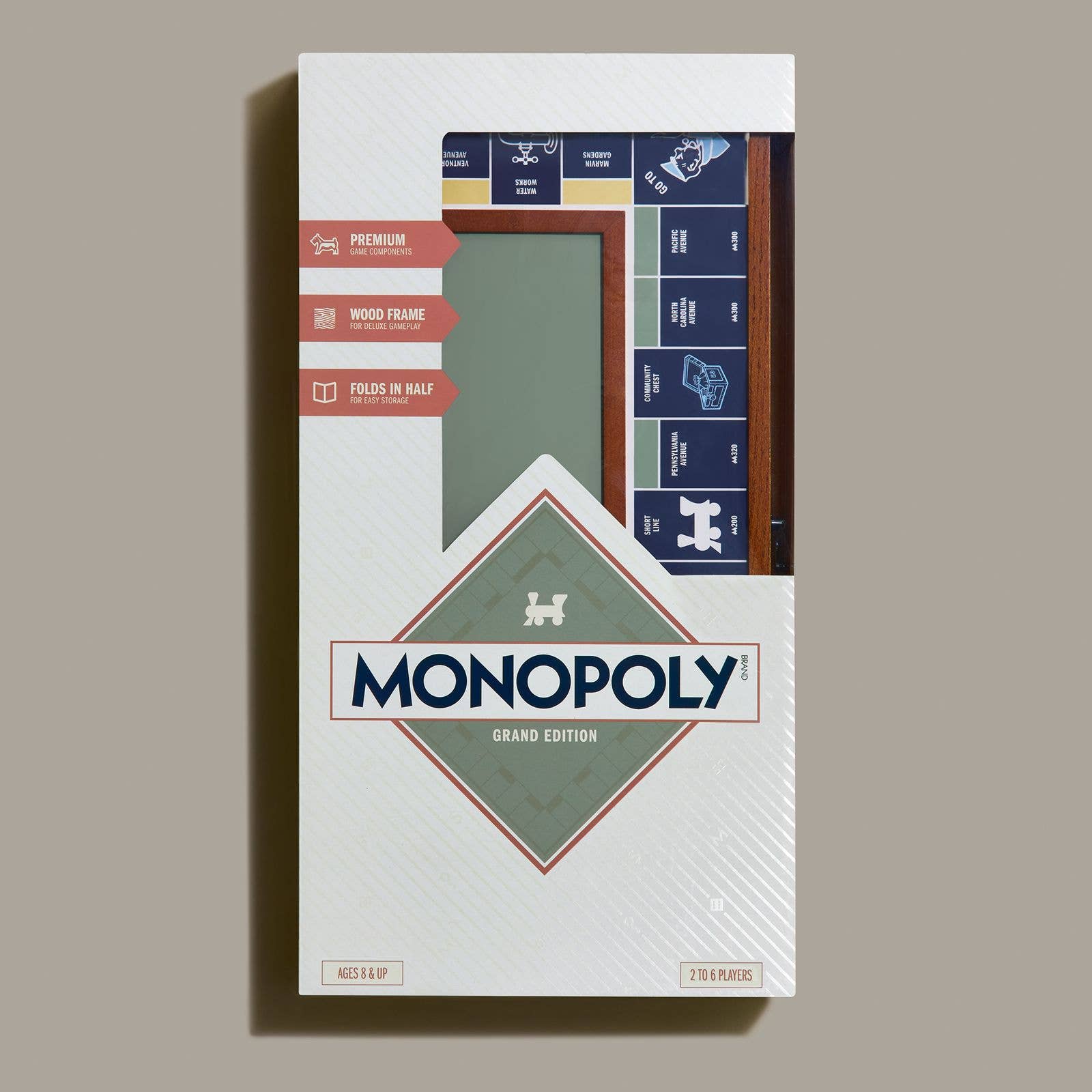 Monopoly Grand Folding Edition on a green background at Addison West