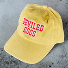 Deviled Eggs Baseball Hat on a grey background at Addison West