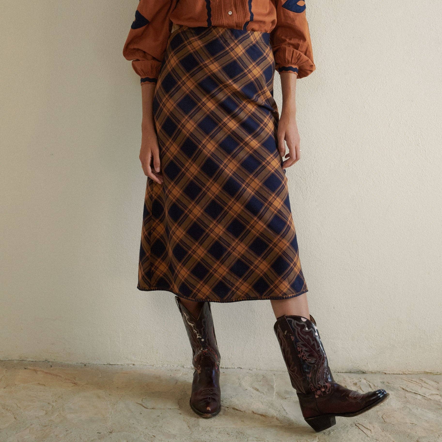 Plaid Midi Skirt on a white background at Addison West