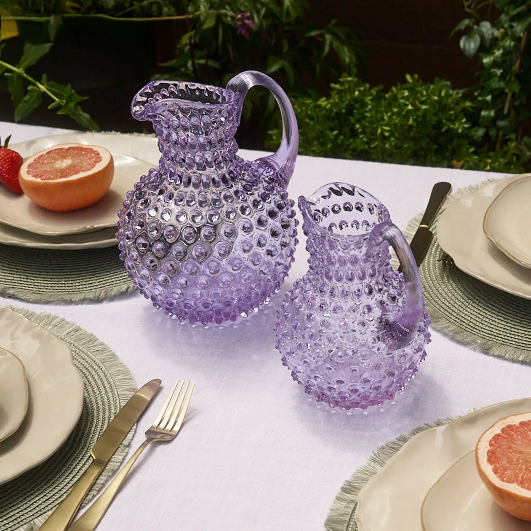 Hobnail Glass Pitcher in Lilac Bloom on a table at Addison West