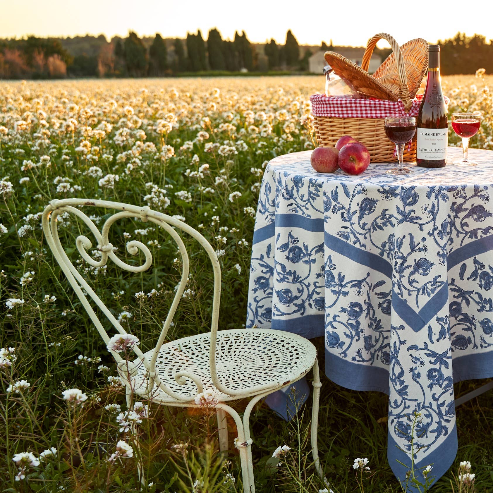Granada Cornflower Tablecloth 59" x 59" on a table at Addison West