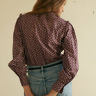 Chloe Blouse in Wine on a white background at Addison West