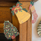 East End Press Christmas Sewn Garland on a fireplace at Addison West