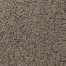 Close up of Four Hands Fabian Chair in Taupe Shearling on a white background at Addison West