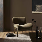 Four Hands Celine Chair in Monte Olive on in a living room at Addison West