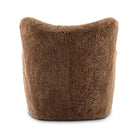 Four Hands Amelie Chair in Amber Shearling on a white background at Addison West 