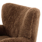 Four Hands Amelie Chair in Amber Shearling on a white background at Addison West