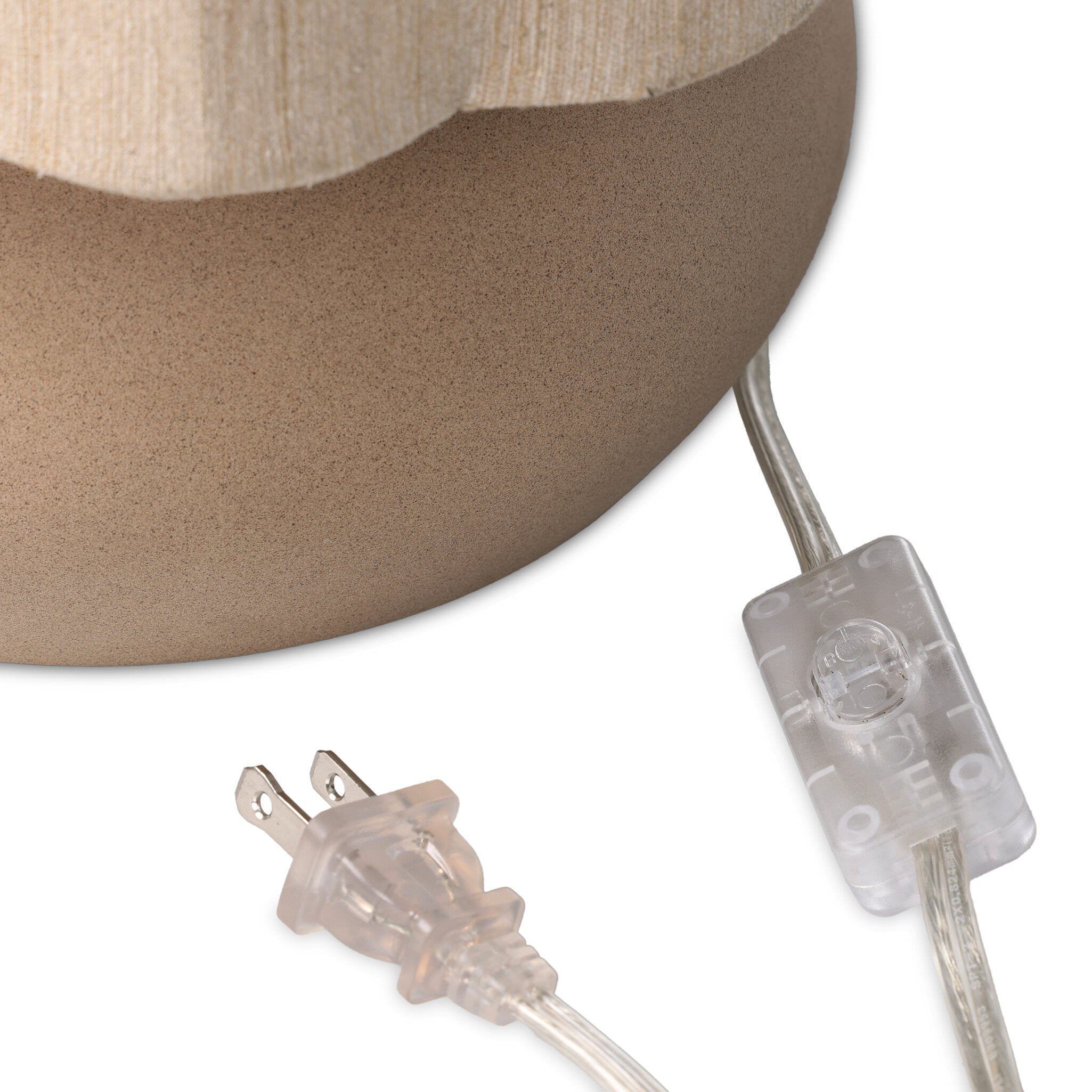 Four Hands Posie Table Lamp in Tan Speckled Ceramic on a white background at Addison West