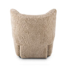 Four Hands Amelie Swivel Recliner in Beige Shearling on a white background at Addison West