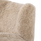 Four Hands Amelie Swivel Recliner in Beige Shearling on a white background at Addison West