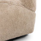 Four Hands Amelie Swivel Recliner in Beige Shearling on a white background at Addison West