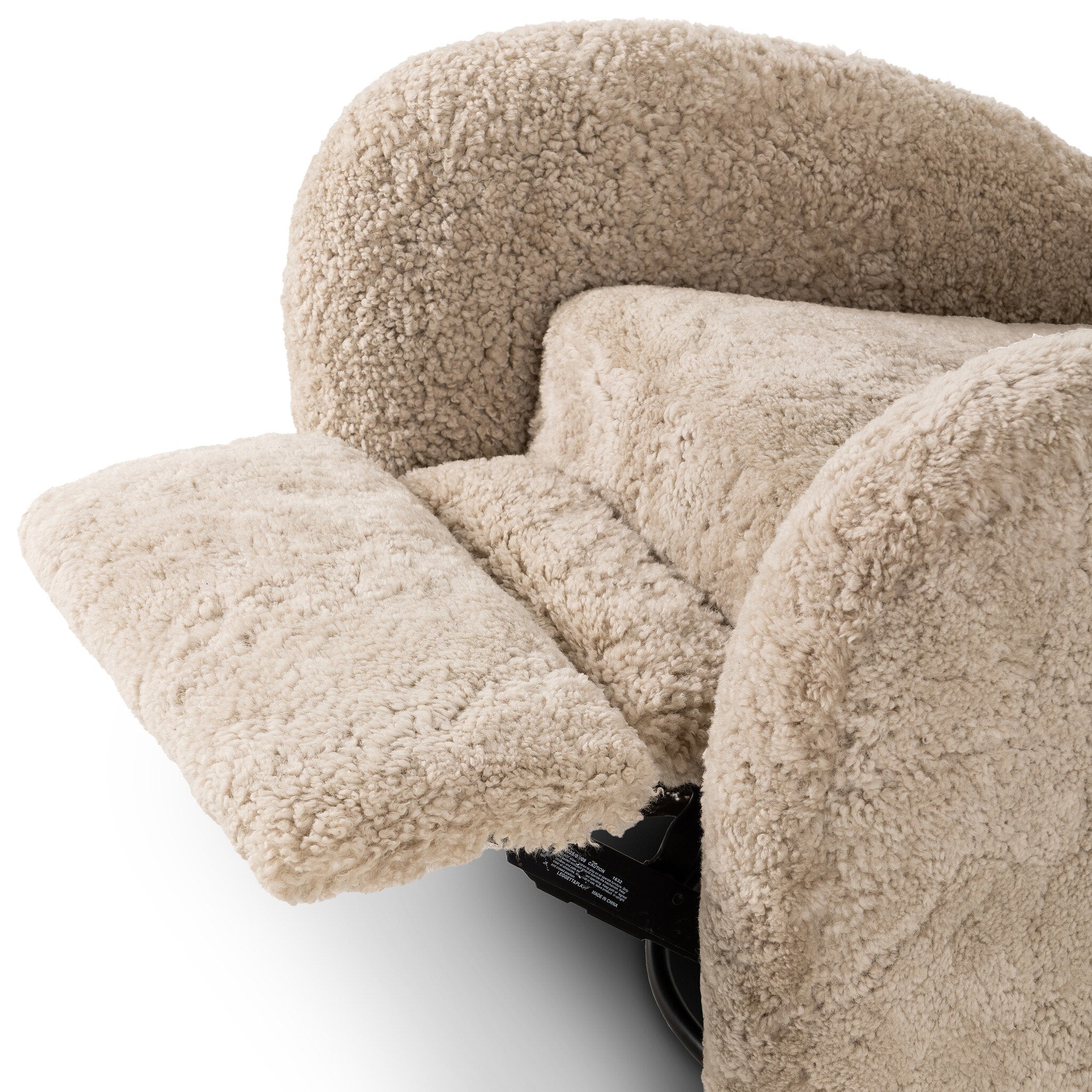 Four Hands Amelie Swivel Recliner in Beige Shearling on a white background at Addison West