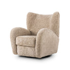 Four Hands Amelie Swivel Recliner in Beige Shearling on a white background at Addison West