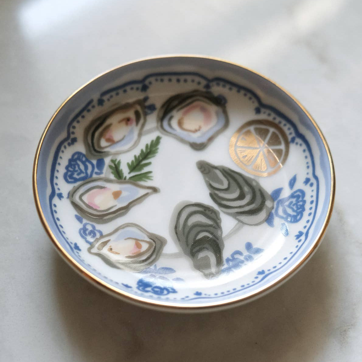 Oysters Trinket Dish on a beige background at Addison West