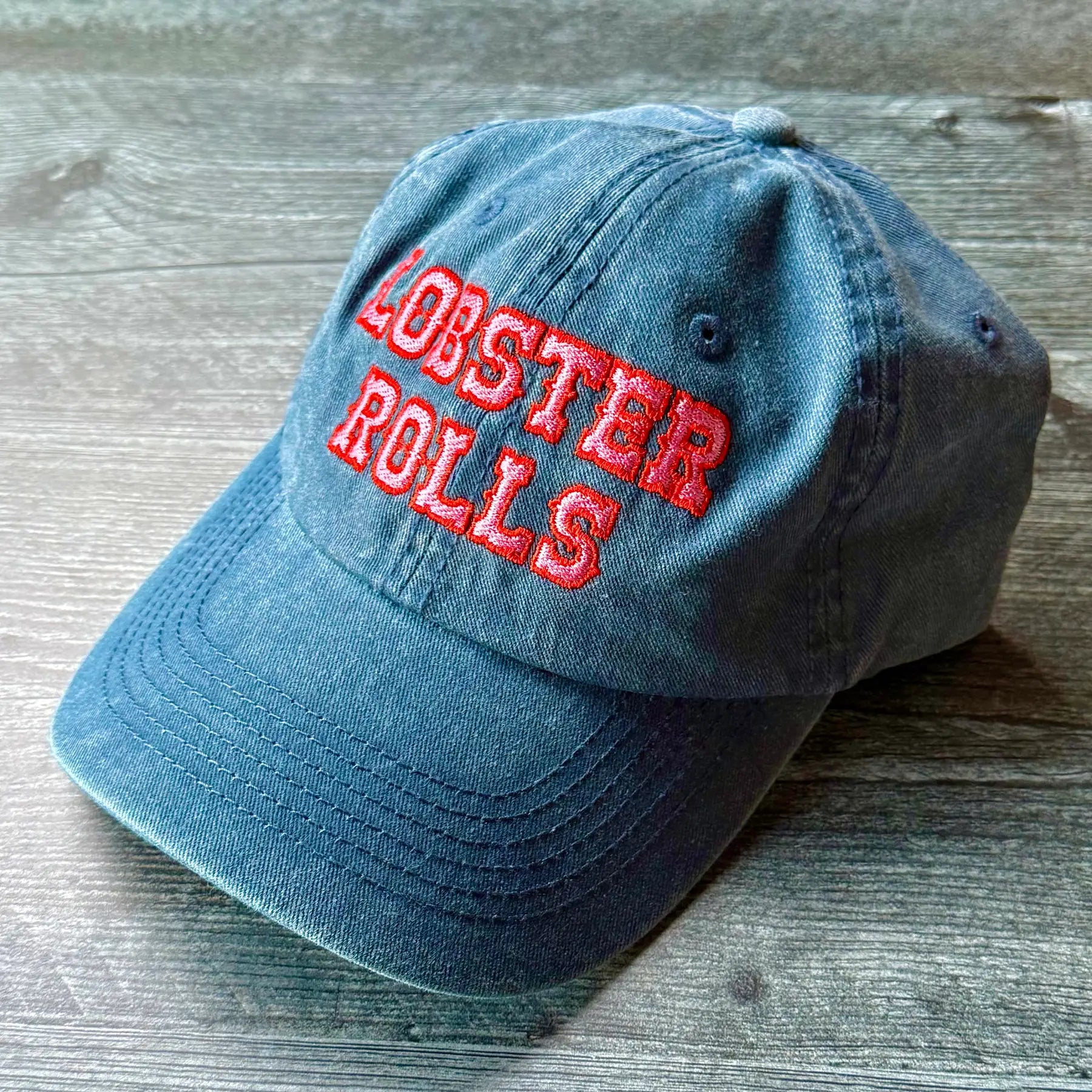 Lobster Roll Baseball Hat on a grey background at Addison West