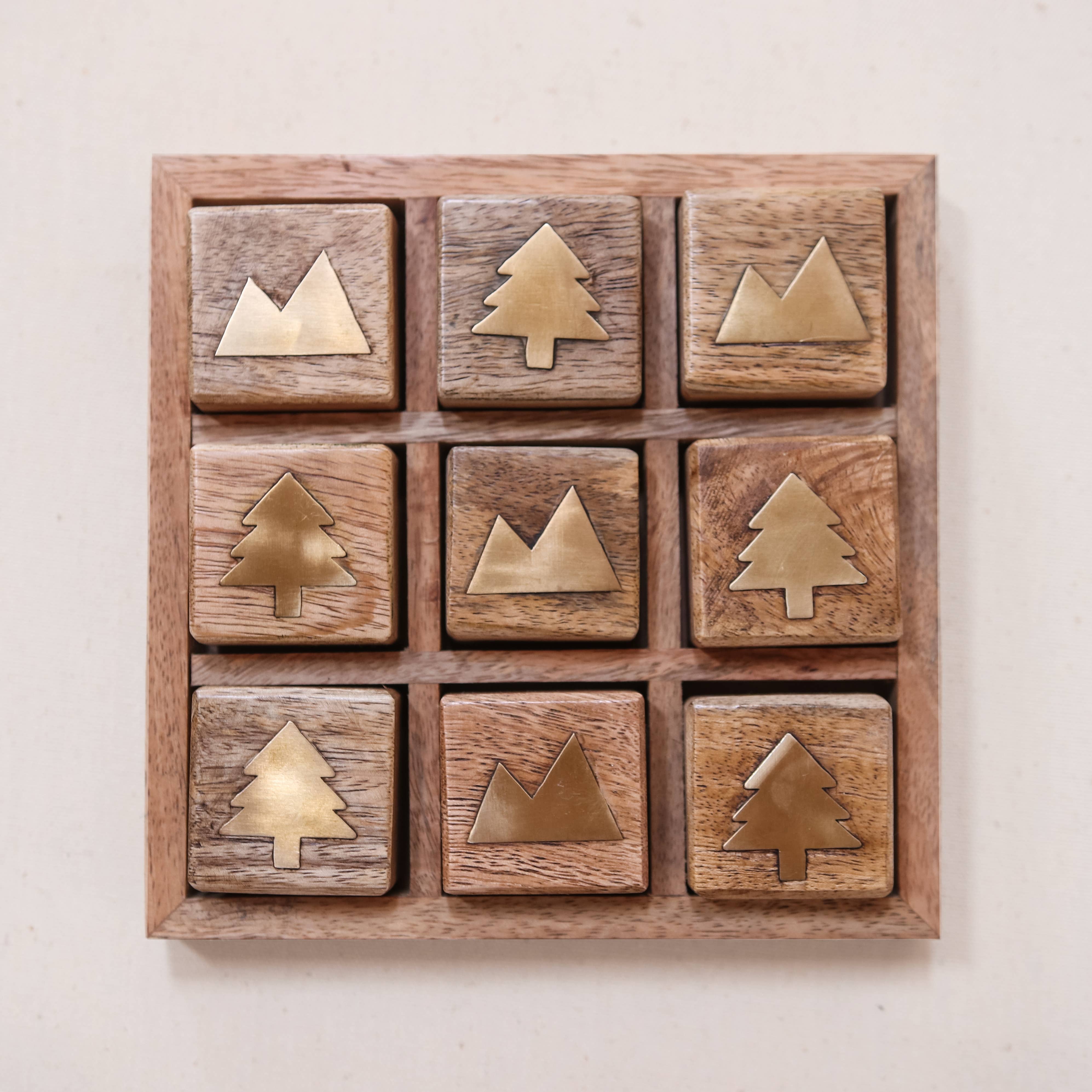 Mountain vs. Trees Tic Tac Toe Board on a white background at Addison West