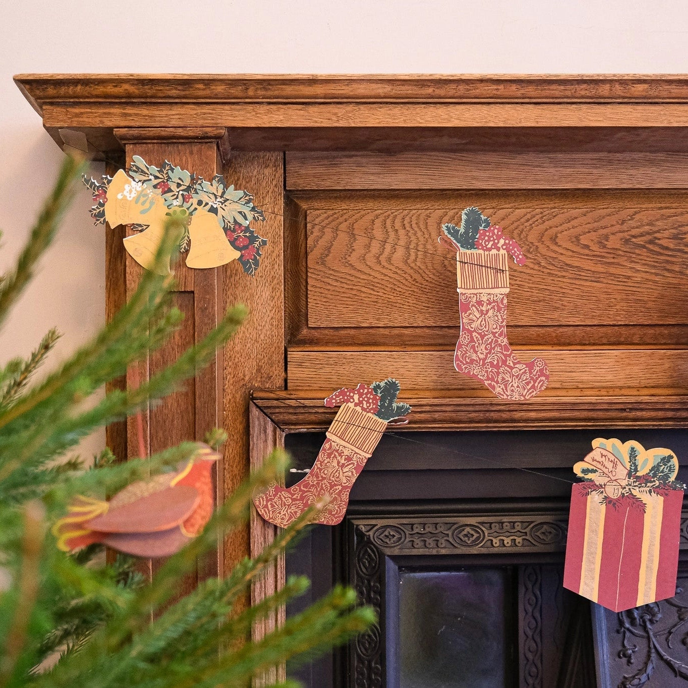 East End Press Christmas Sewn Garland on a fireplace at Addison West