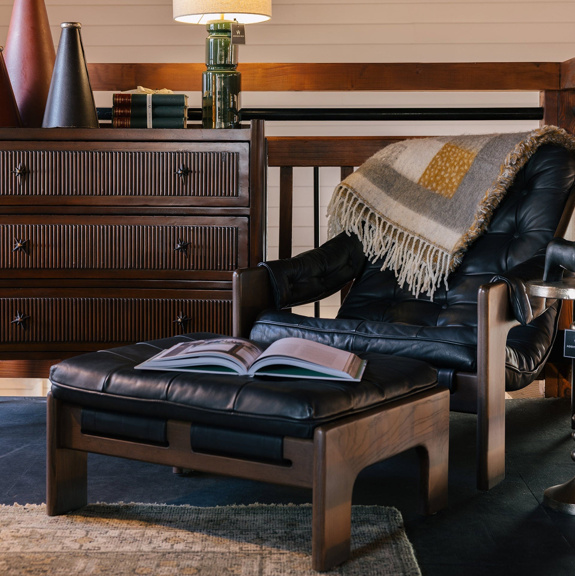 Four Hands Halston Chair in Heirloom Black in a living room at Addison West