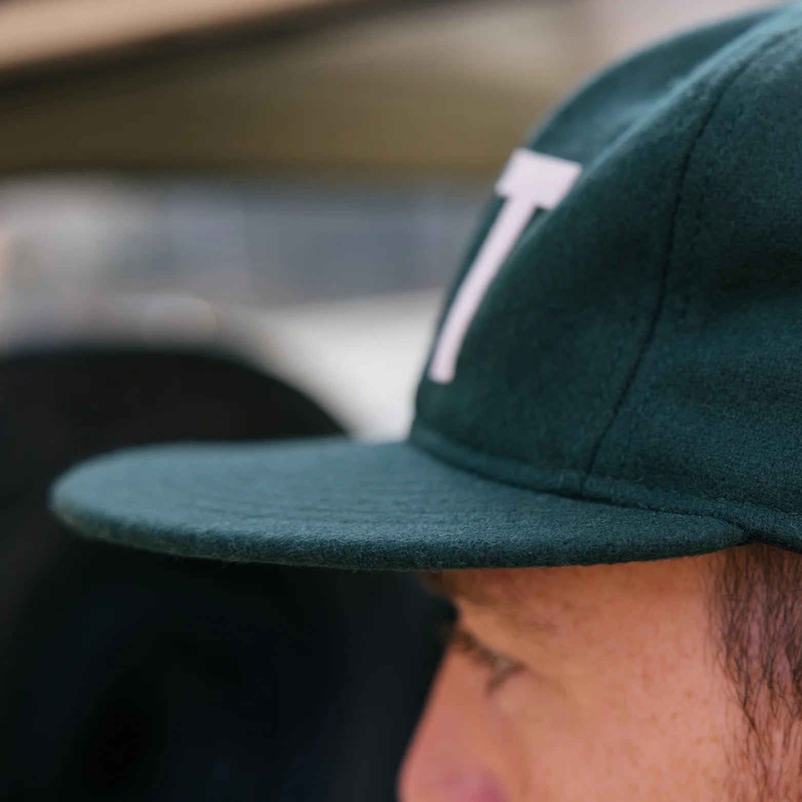 Warren Farm League Ballcap in Green Mountain State on a model at Addison West