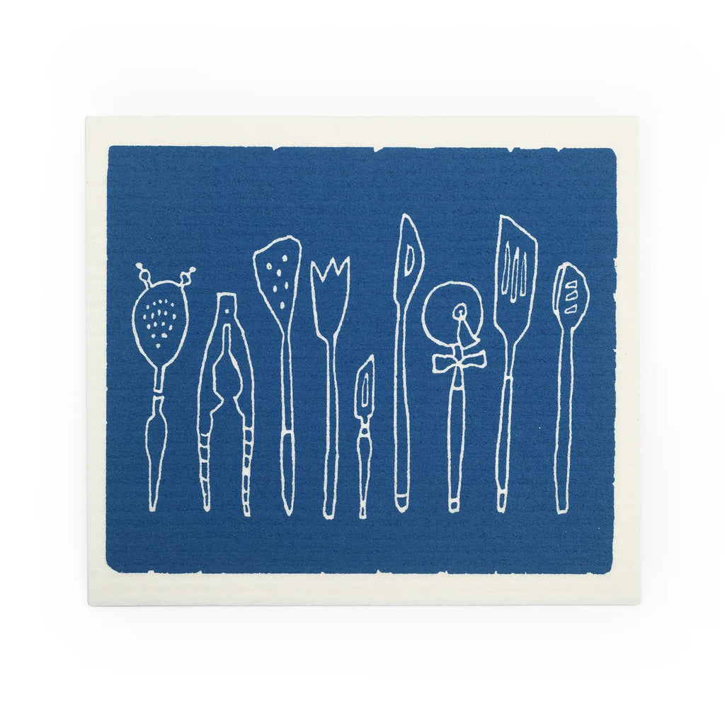 Swedish cloth sponge with kitchen utensils in a row and blue background