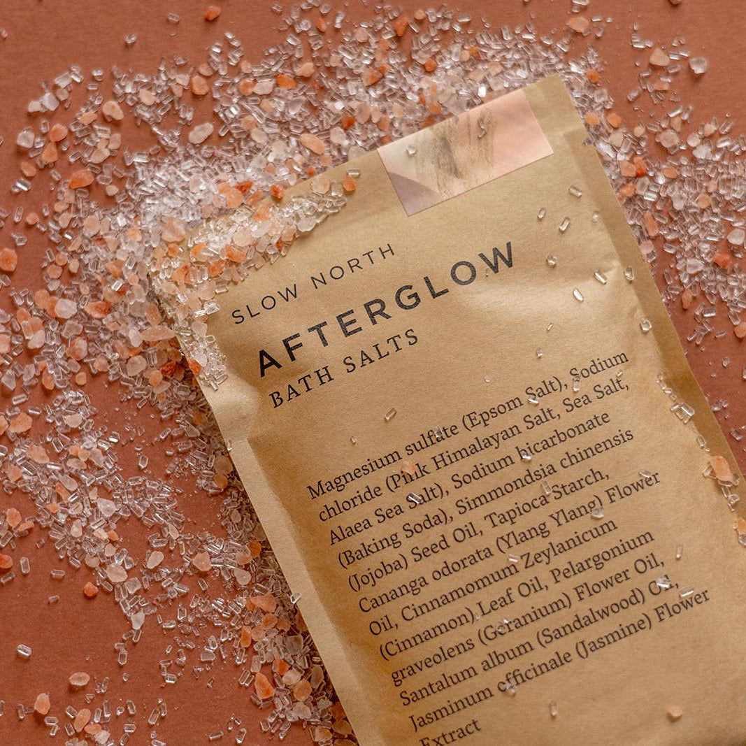 Afterglow Bath Salts in an orange background at Addison West