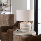 Prowell Table Lamp on a table at Addison West