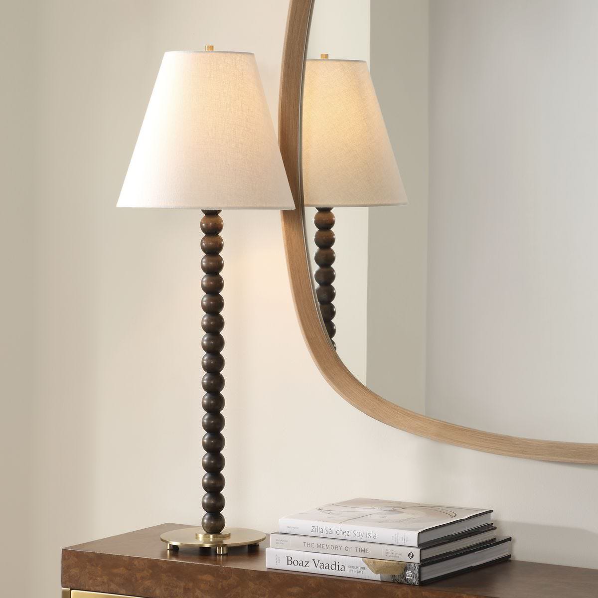 Gavine Table Lamp with dark walnut spheres on a console table at Addison West
