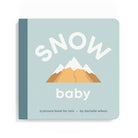 Book titled 'Snow Baby' with mountain illustration on a light blue background