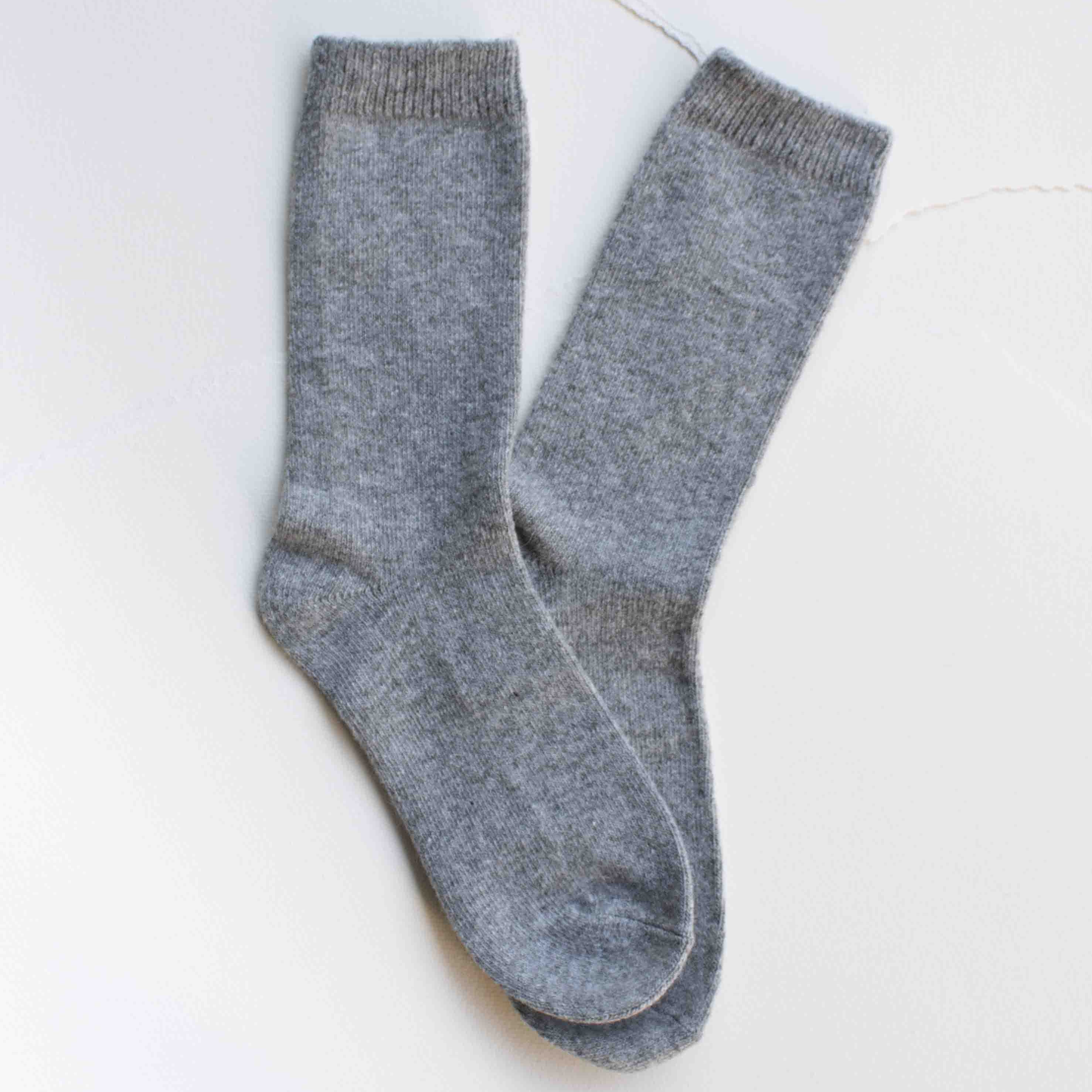 Bright Winter Wool Cashmere Socks in Grey on a white background at Addison West