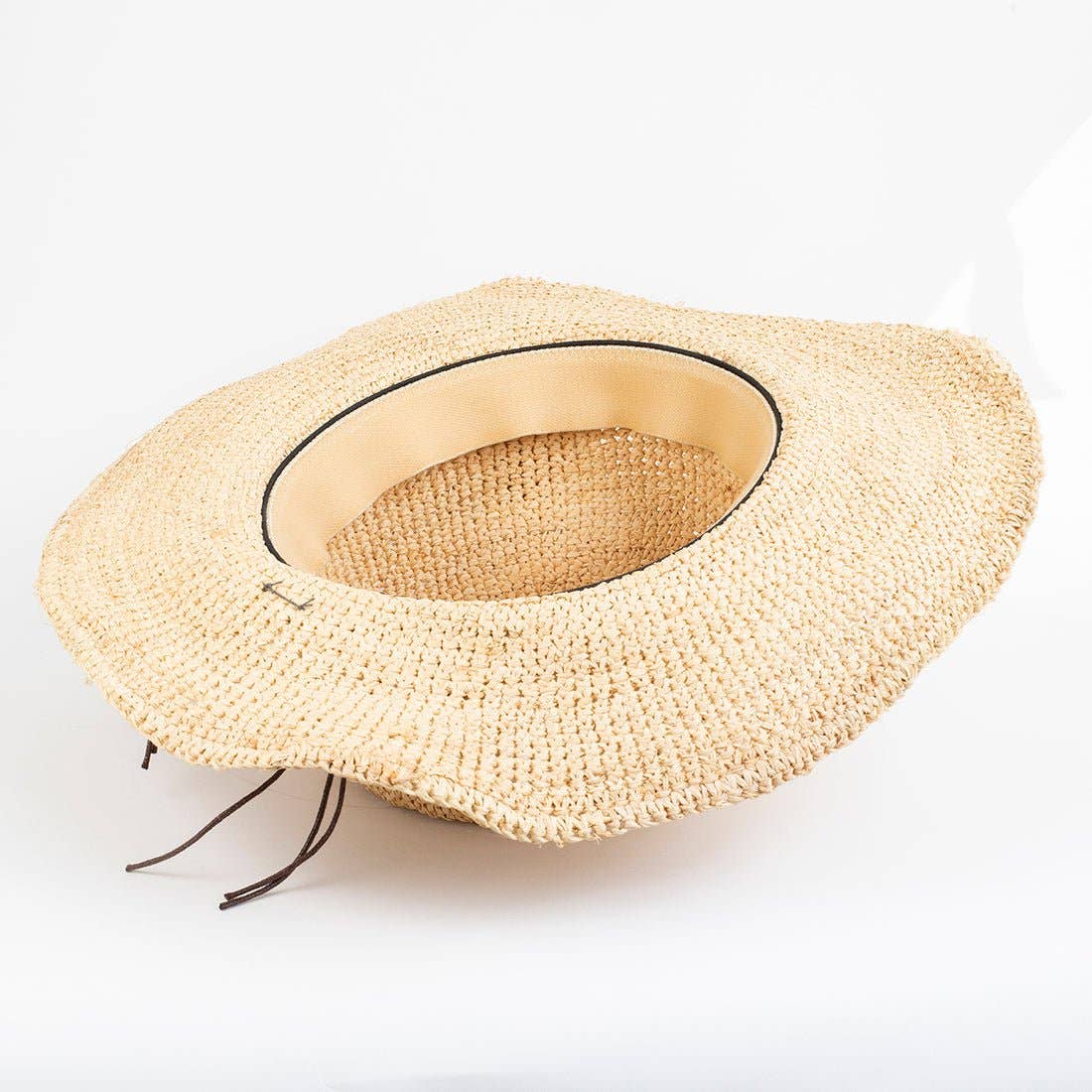 Goldie Sun Hat in Natural on white background at the Addison West.