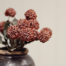 Morandi Bloom Bouquet in Mauve on a beige background at Addison West