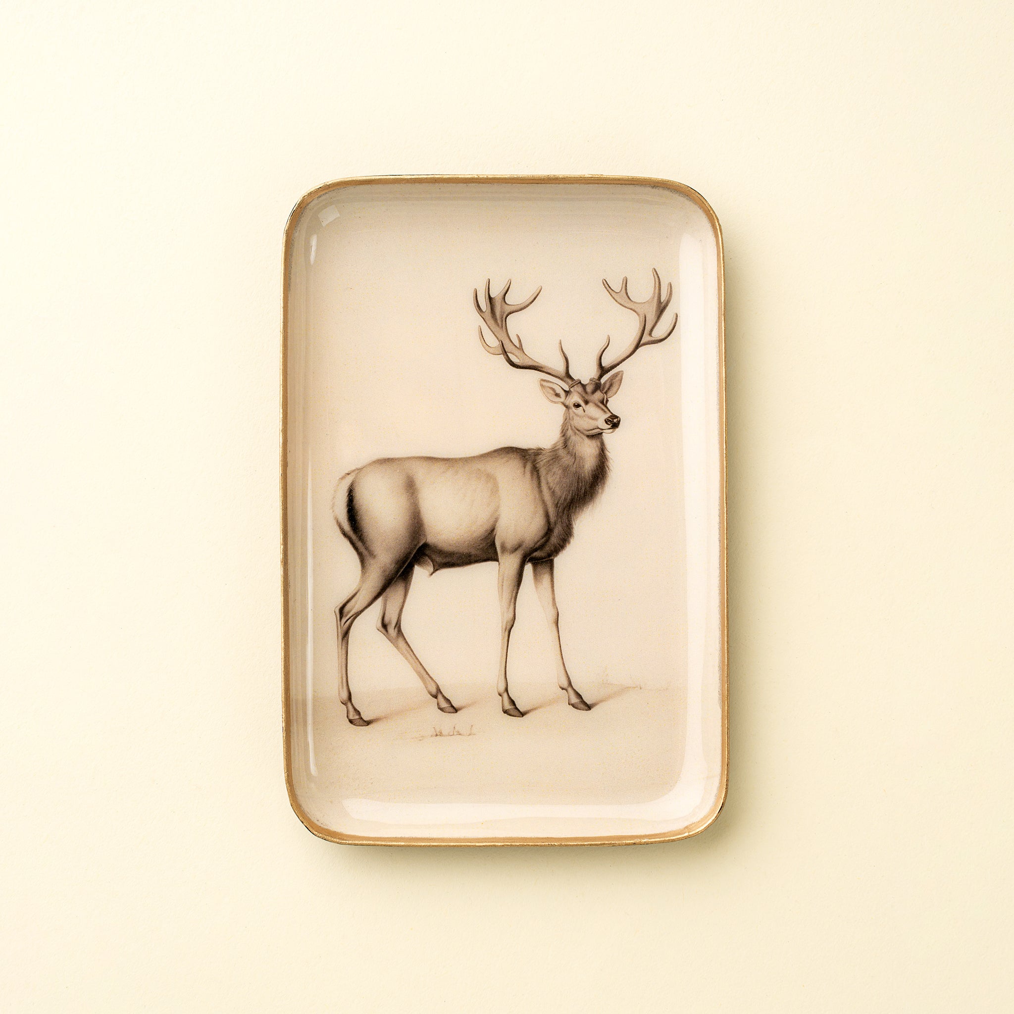 Woodland Stag Enameled Tray on a beige background at Addison West