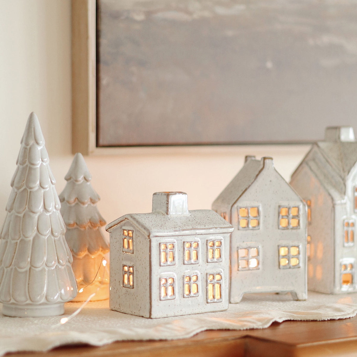 Small Winter Chalet Tealight House on a beige background at Addison West