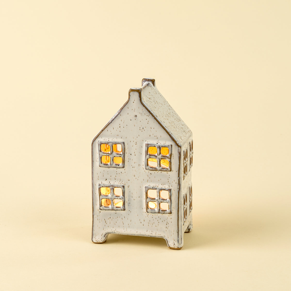 Medium Winter Chalet Tealight House on a beige background at Addison West