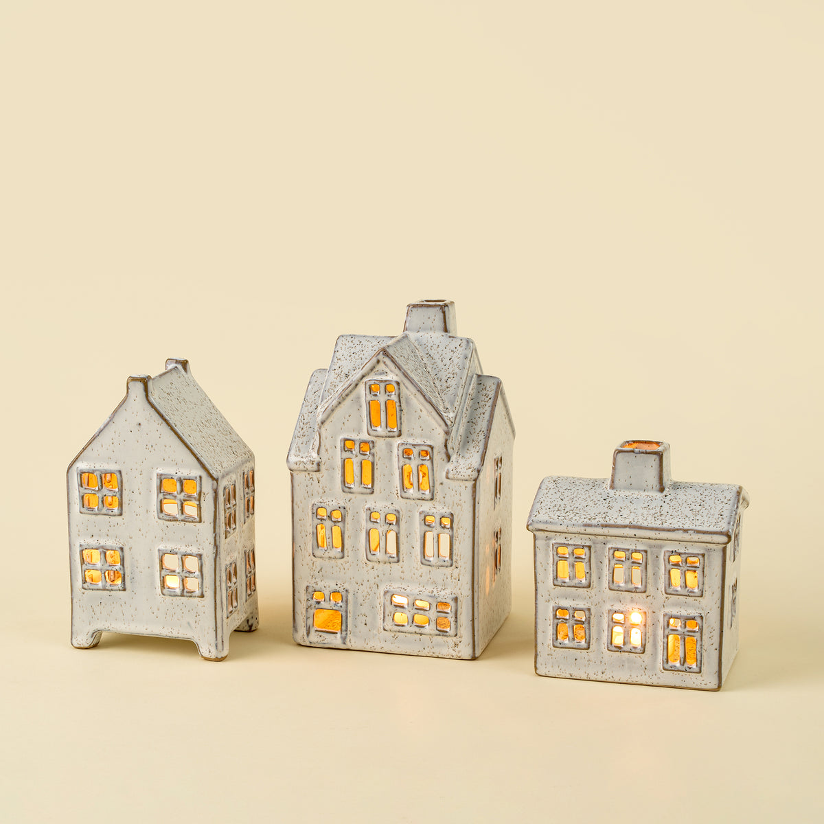 Medium Winter Chalet Tealight House on a beige background at Addison West