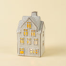 Large Winter Chalet Tealight House on a beige background at Addison West