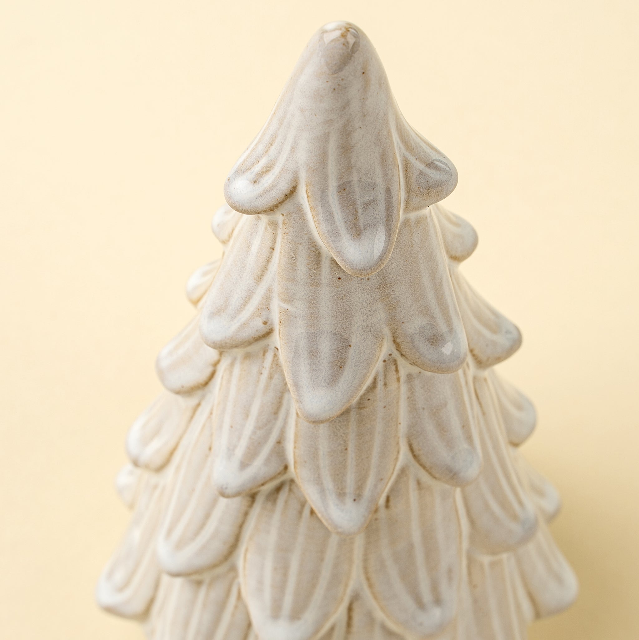 Cedar Snowdrift Ceramic Tree on a beige background at Addison West