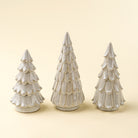 Cedar Snowdrift Ceramic Tree on a beige background at Addison West