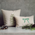 Embroidered Tree Pillow 20" x 20" on a grey background at Addison West
