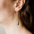 Commonform Aurora Hoops in Turquoise on model at the Addison West.