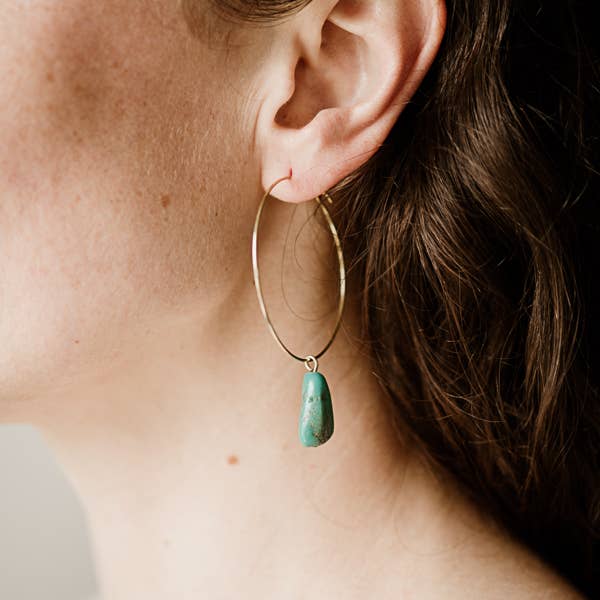 Commonform Aurora Hoops in Turquoise on model at the Addison West.