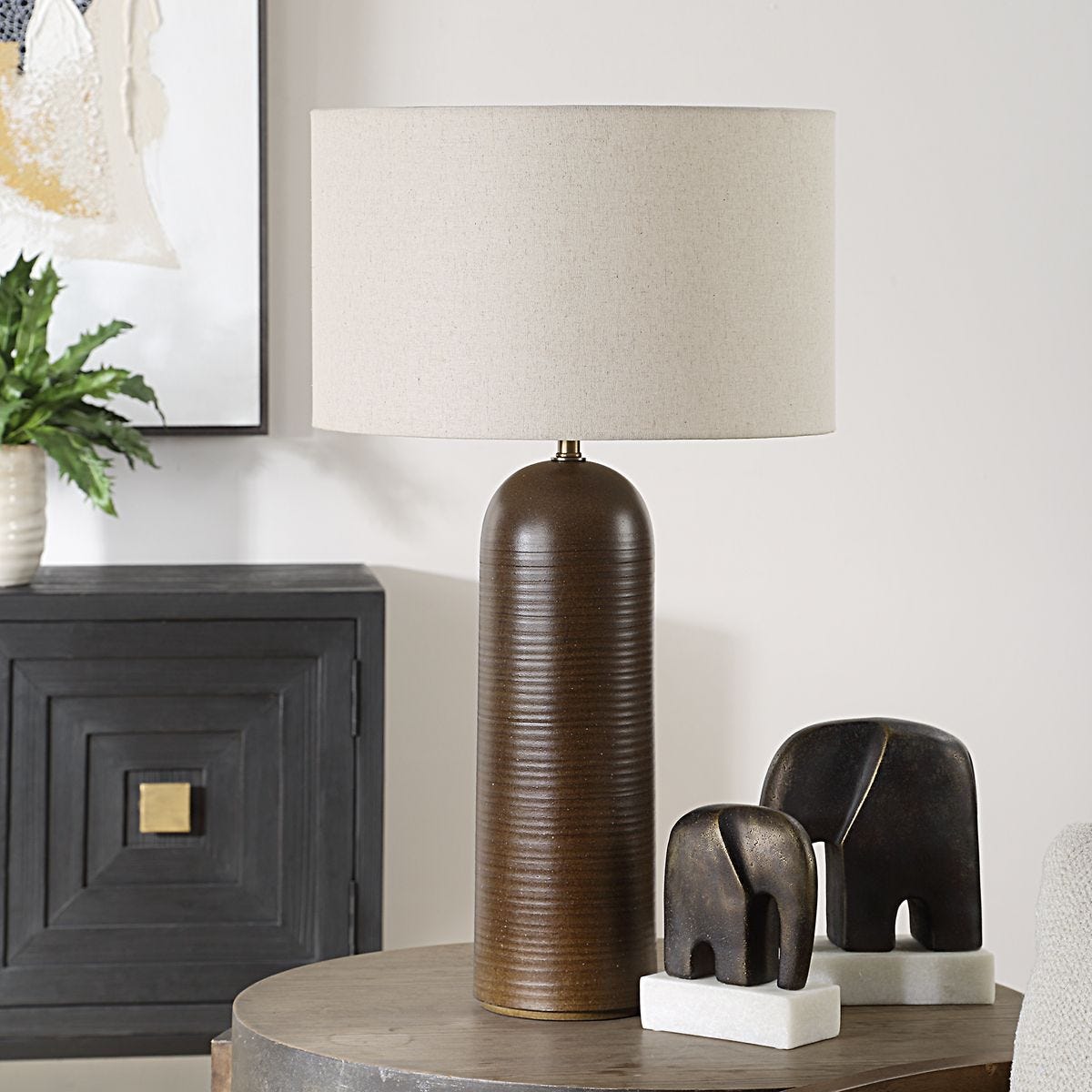 Trevan Table Lamp on a table at Addison West