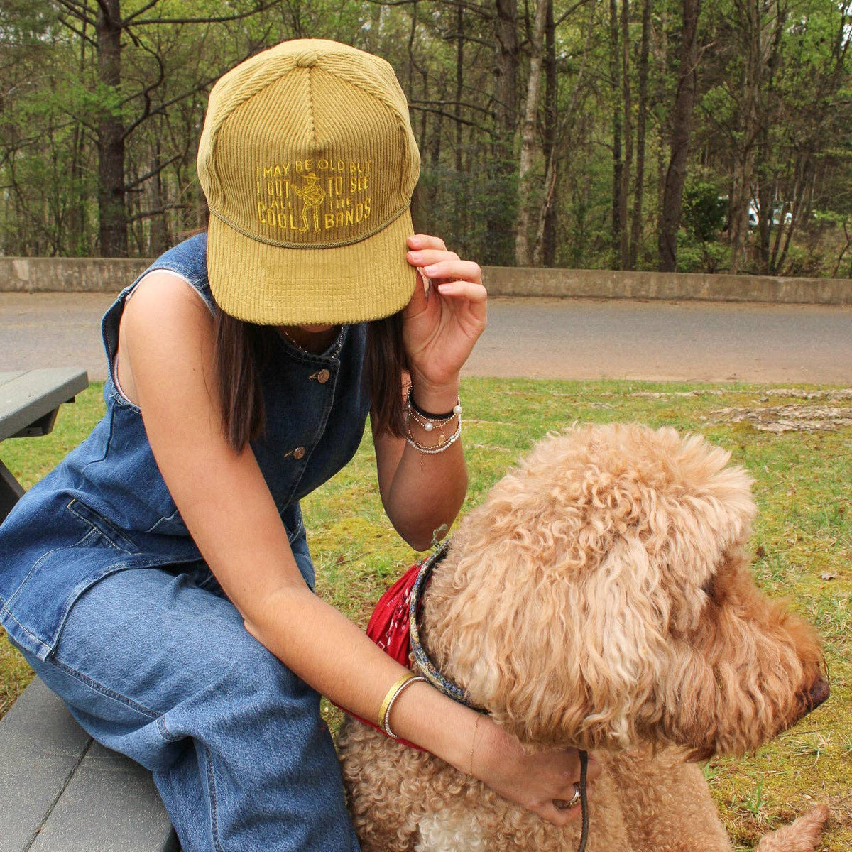 Cool Bands Trucker Hat in Olive on a model at Addison West