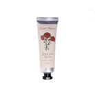 Hand cream tube labeled 'English Rose' with floral design on a white background
