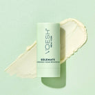 Solemate Heel Repair Balm in Mint on a green background at Addison West
