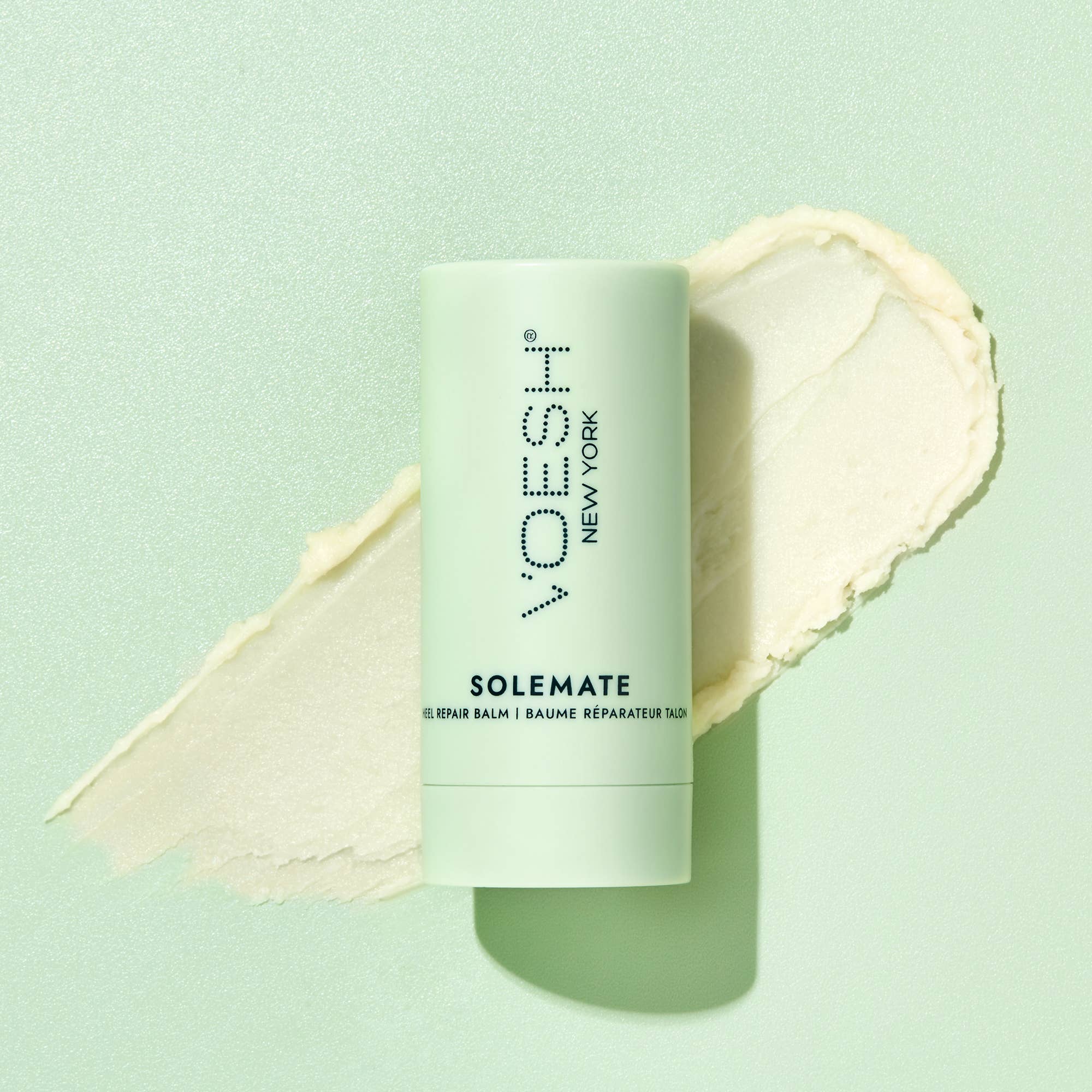 Solemate Heel Repair Balm in Mint on a green background at Addison West