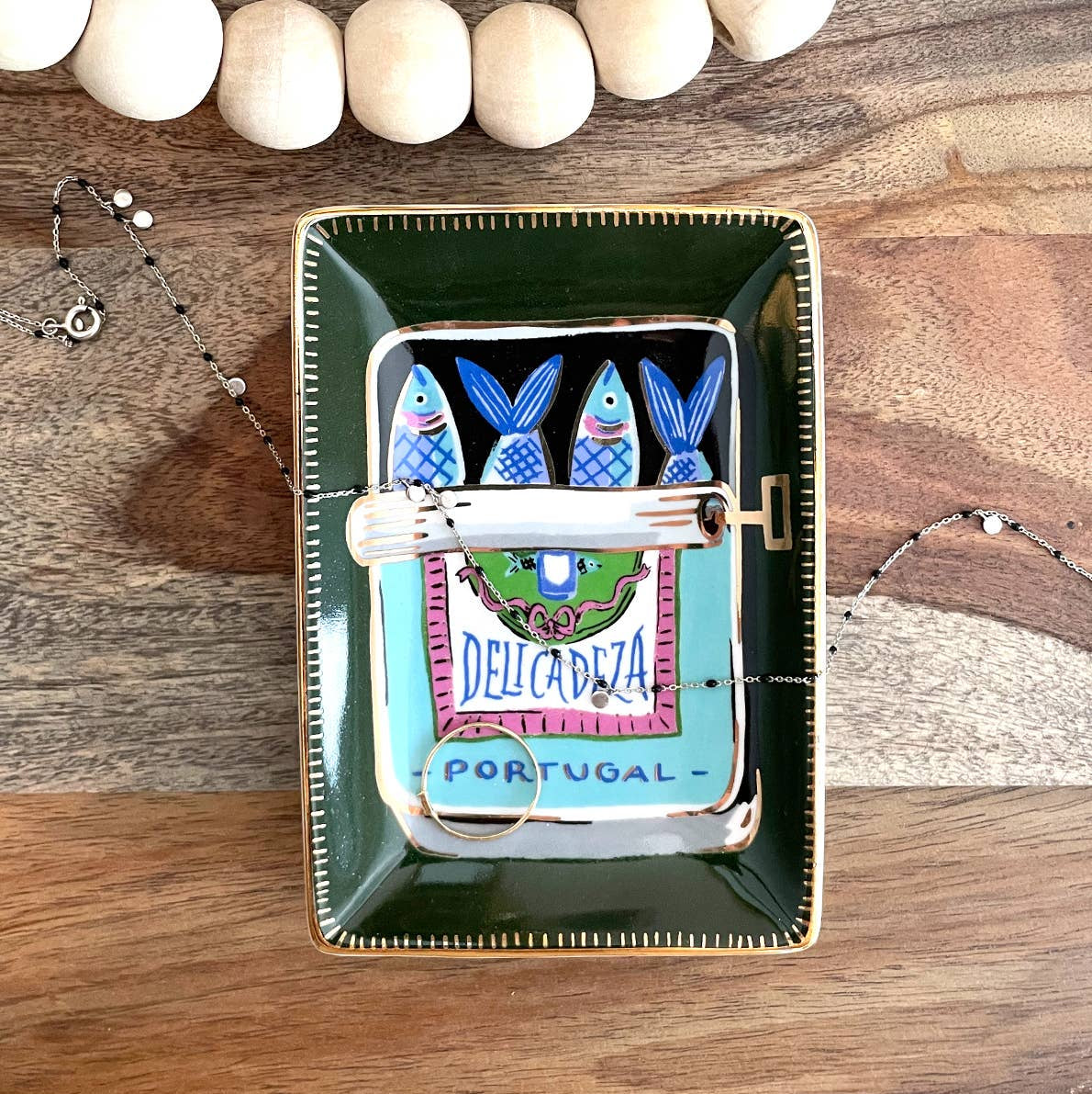 Sardines Trinket Dish on a wood background at Addison West