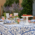 Granada Cornflower Tablecloth 71" x 128" on a table at Addison West